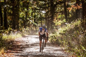 A cyclist climbs FR85 included on the Alpine Loop route of the 2017 Alpine Loop Gran Fondo
