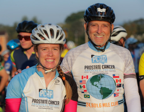 Multi-year fundraising participant Sarah Hynes joins CFJ CEO Robert Hess on the start line of the 2019 Alpine Loop Gran Fondo.